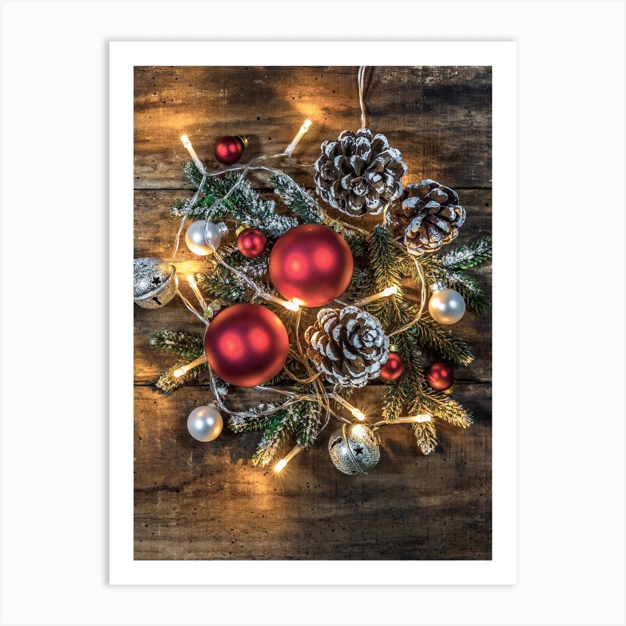 Christmas Decorations On A Wooden Table Art Print by imagine