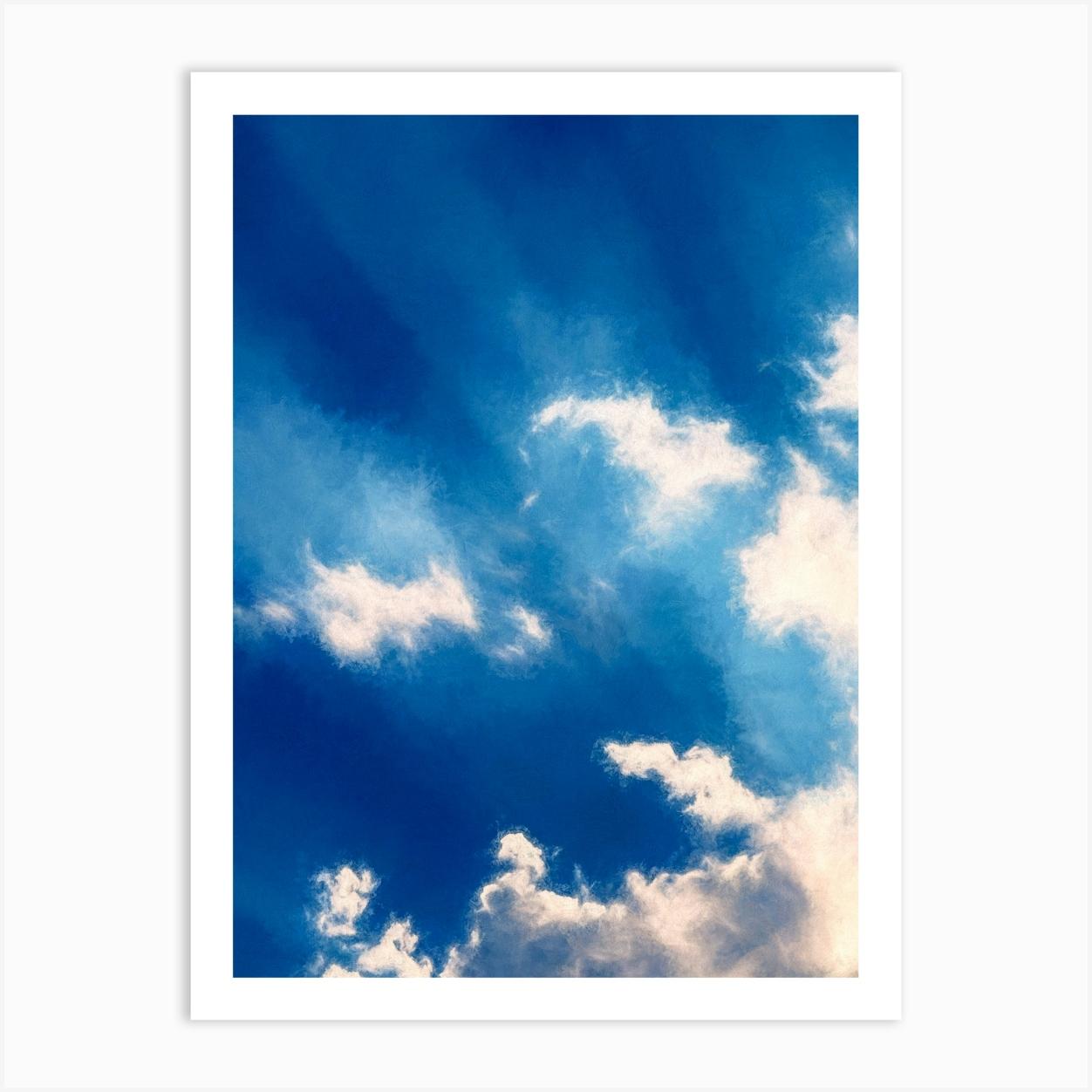 Shafts Of Light On Clouds Art Print by Paul J Bucknall
