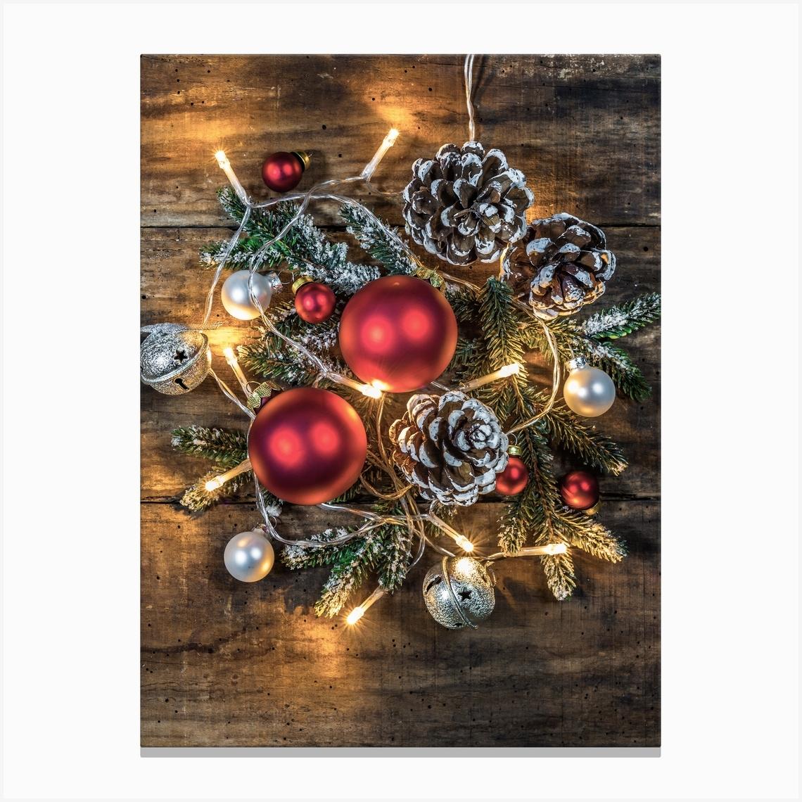 Christmas Decorations On A Wooden Table Canvas Print by imagine