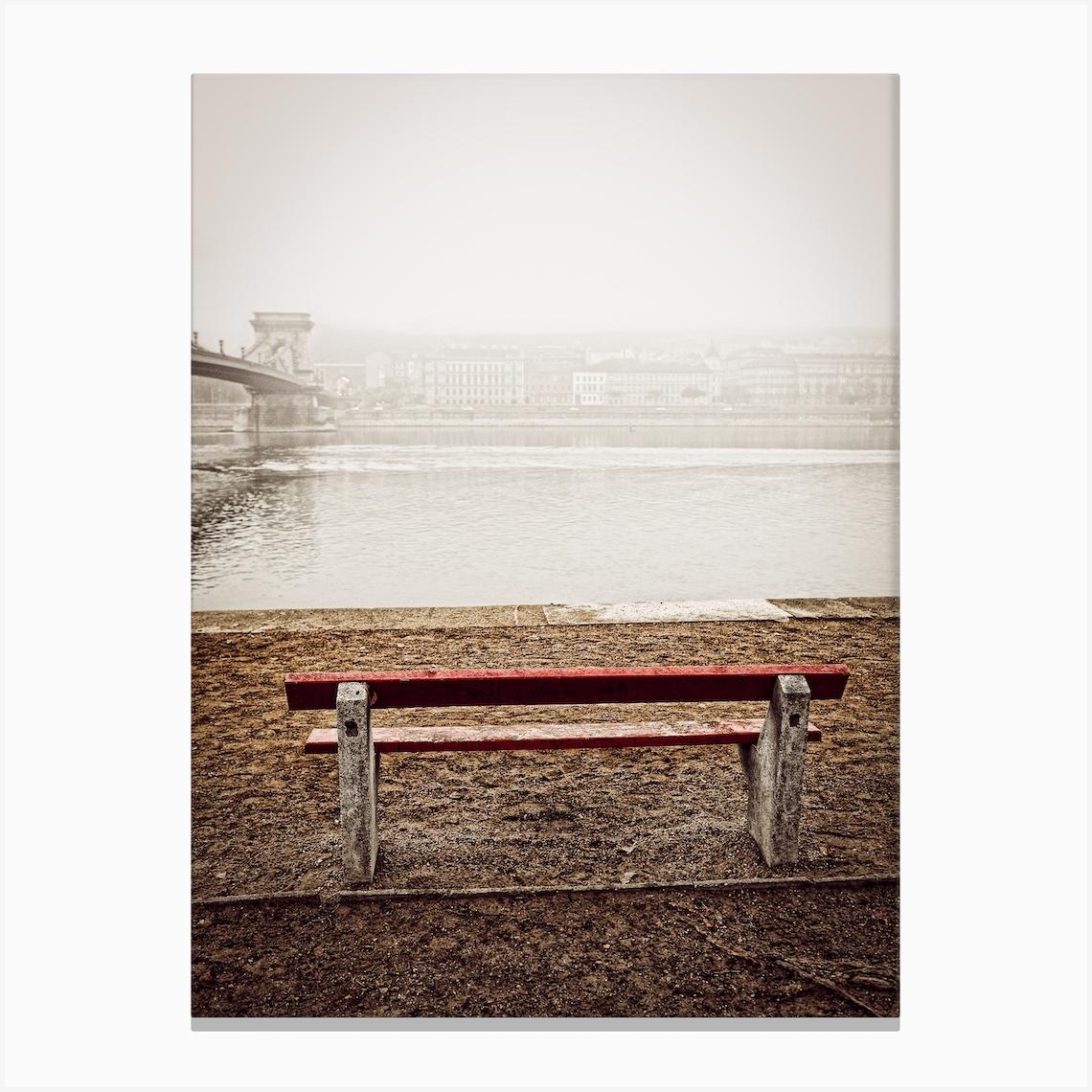 The Red Bench By The Danube In Budapest Canvas Print by Paul J Bucknall